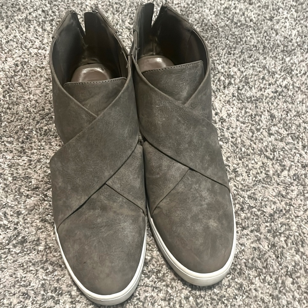 Lightly worn wedge sneaker